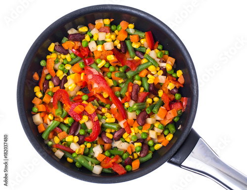 Vegetable mixed with beans and corn in frying pan,top view, isolated on white
