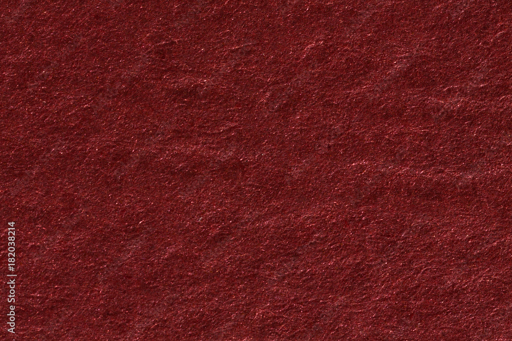 Fototapeta premium Crushed red highly textured background for christmas.