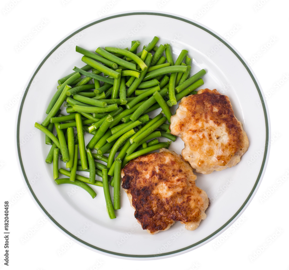 Fototapeta premium Plate with green beans and meat on white background, top view