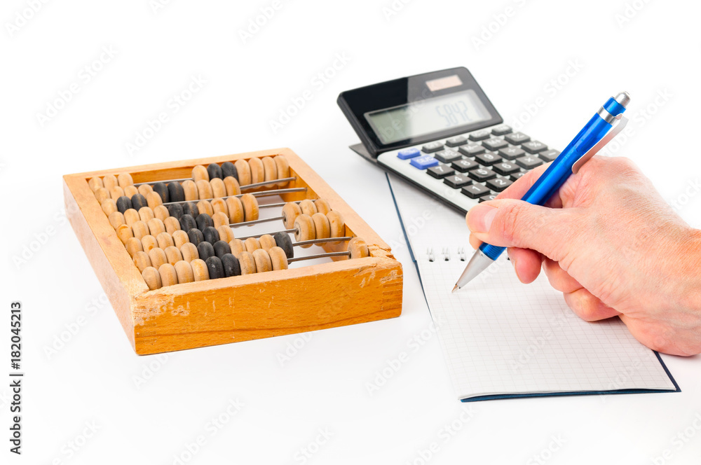 Business concept with old abacus and calculator on white background Business concept with old abacus and calculator on white background
