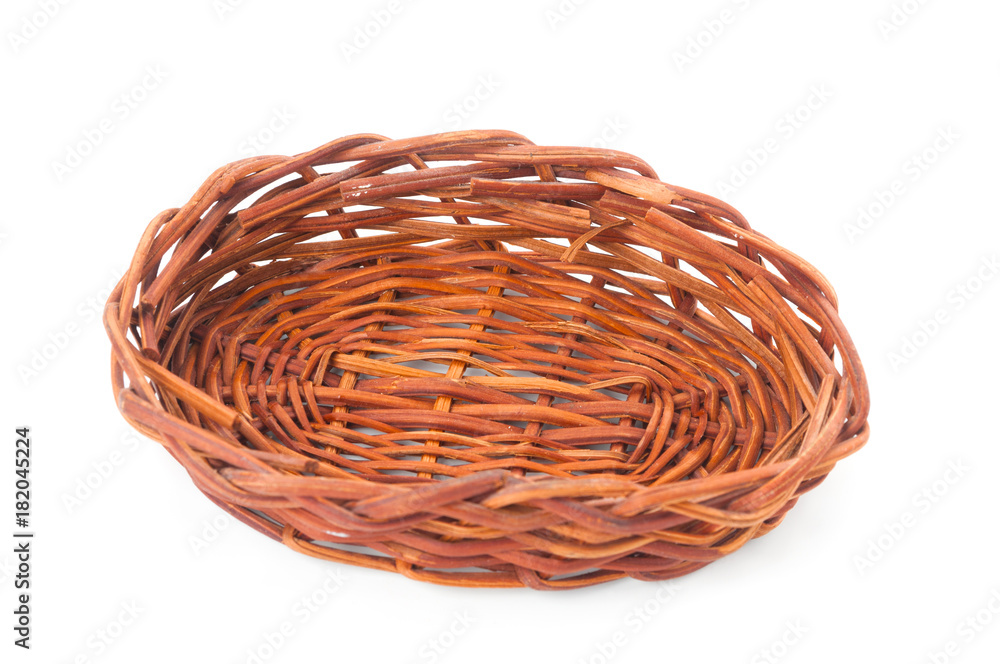 Obraz premium Wicker basket on white background