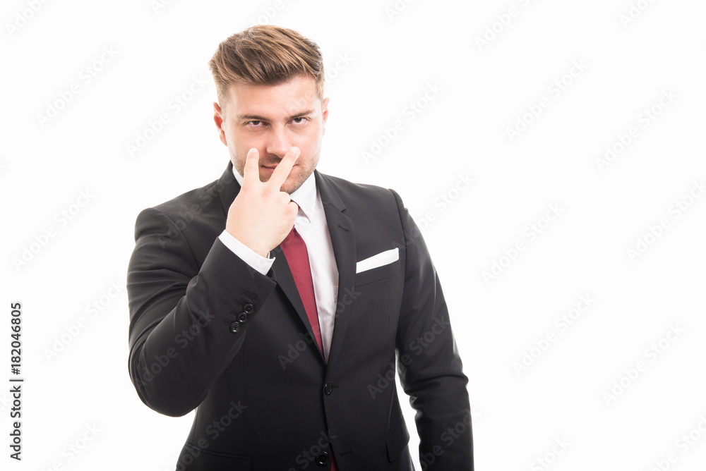 Handsome business man showing watching you gesture Handsome business man showing watching you gesture
