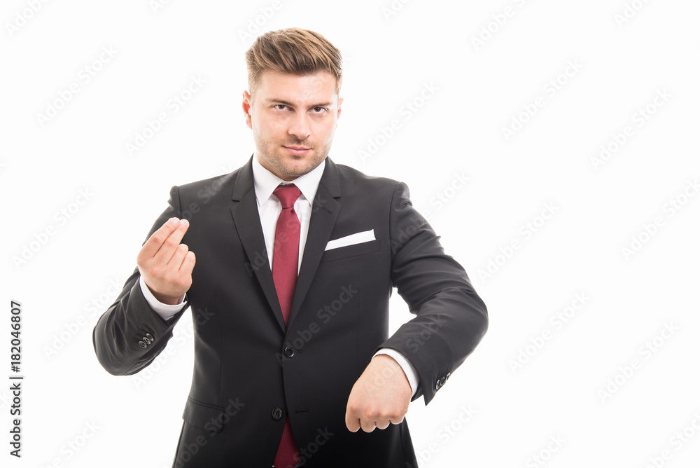 Handsome business man showing time is money Handsome business man showing time is money
