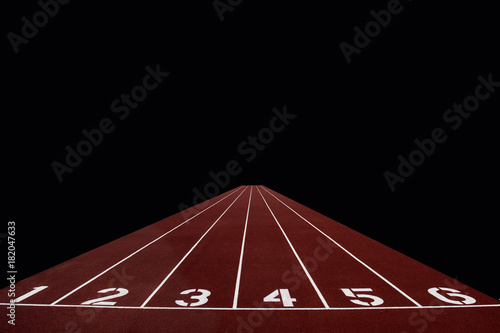 Athletic track on black background