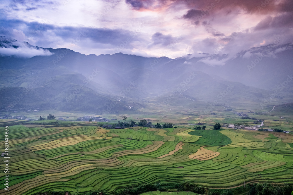 Viewpoint rice field terraced and mountain at colorful sunset in Tule