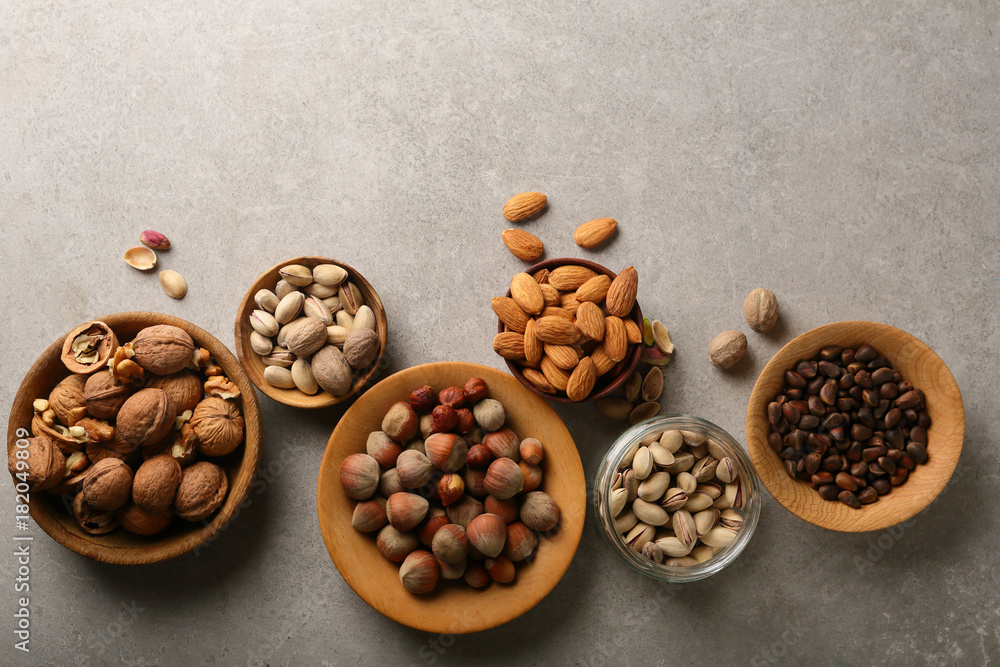Mixed nuts on stone background Mixed nuts on stone background