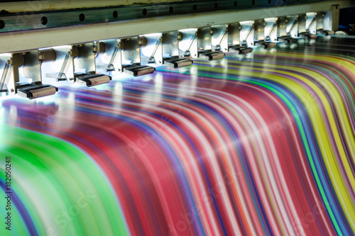 Large inkjet printer working multicolor on vinyl banner photo