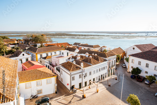 Top cityscape view on the old town with beautiful rooftops in Faro on the south of Portugal