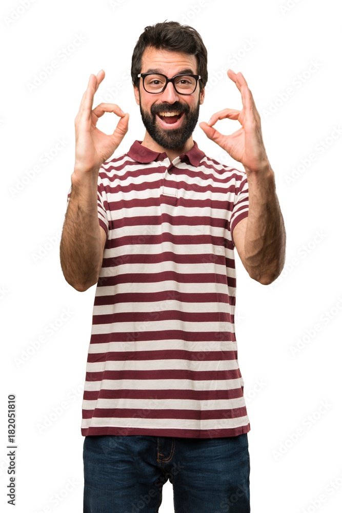 Man with glasses making OK sign Man with glasses making OK sign