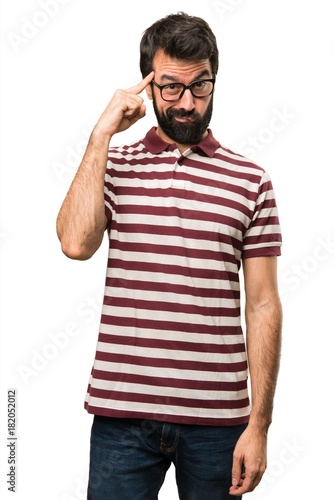 Man with glasses thinking