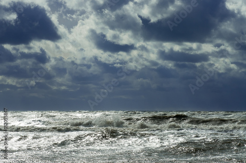Storm on the sea wave against a cloud background in the sky landscape