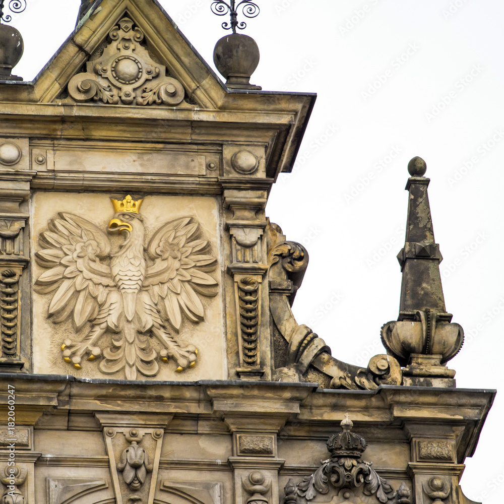 Obraz premium beautiful bas-relief on the wall of the old building