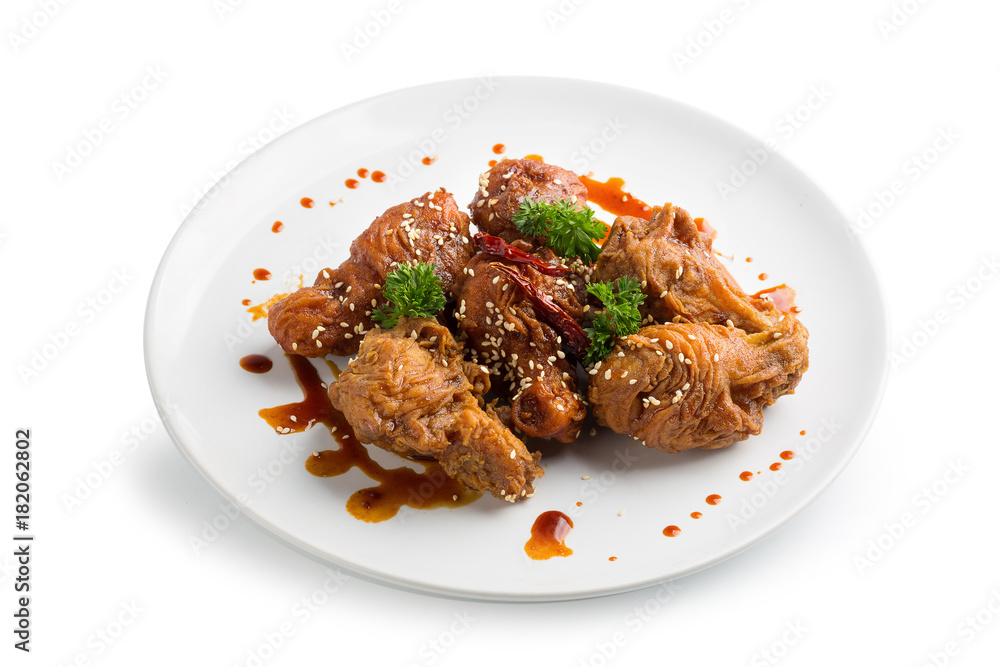 Spicy Deep Fried Breaded Chicken Wings isolated on white background Spicy Deep Fried Breaded Chicken Wings isolated on white background