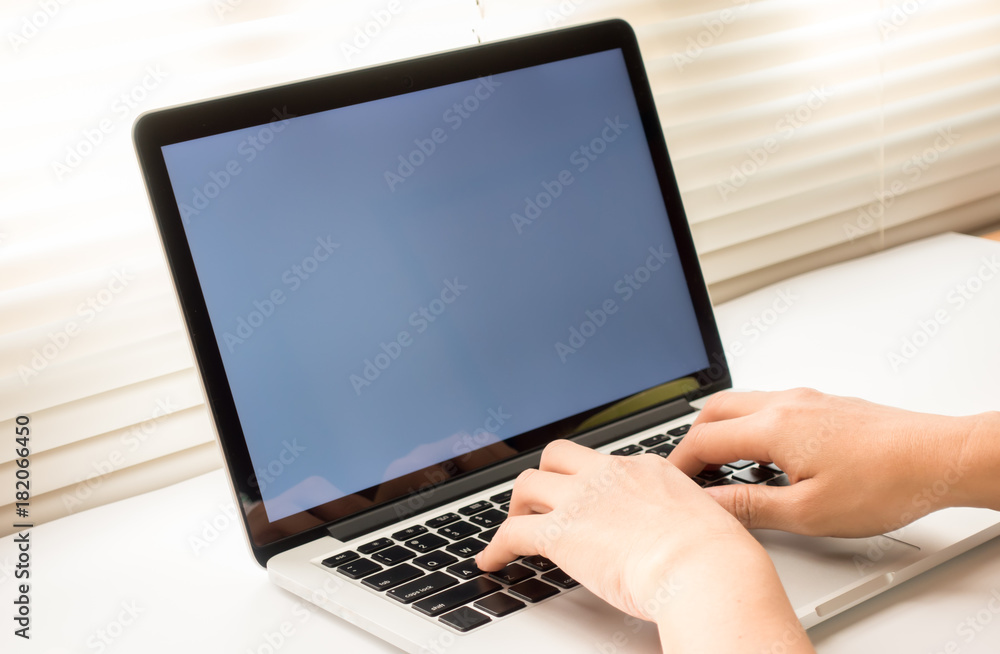 Business Technologies. Workplace with open laptop on modern wooden desk. Business Technologies. Workplace with open laptop on modern wooden desk.