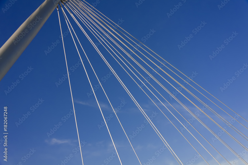 looking at the sky through the cables of a suspension bridge in the City of tampere. Finland. looking at the sky through the cables of a suspension bridge in the City of tampere. Finland.