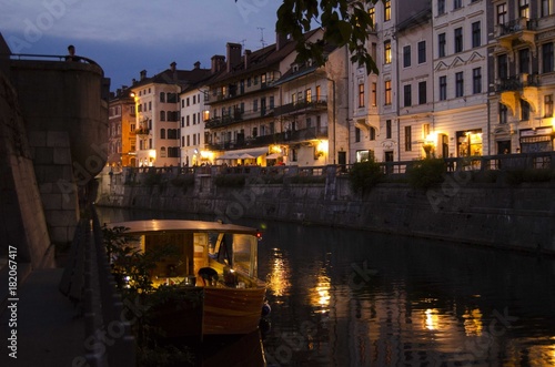 Romantic evening on Ljubljanica river under Ljubljana castle  Slovenia 