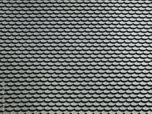 Hintergrund moderne Biberschwanzziegel bilden ein Muster im Streiflicht - Background modern plain tile tiles form a pattern in the sidelight