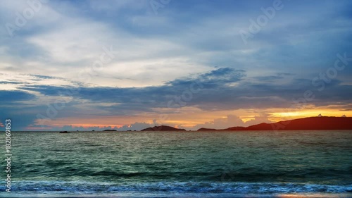 Bright evening and sunset on the tropical sea with islands on the horizon