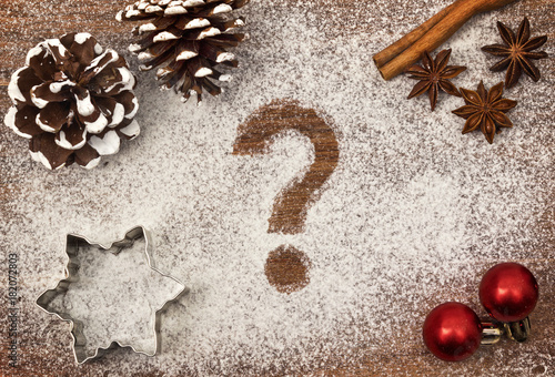 Festive motif of flour in the shape of a question mark (series)
