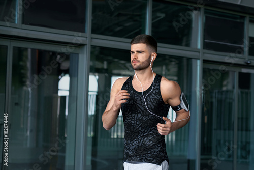 Man Running And Listening Music On Street Free Download Man Running And Listening Music On Street - GFXLoad