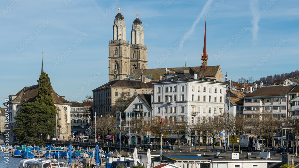 View of Grossmunster Church in Zurich old town, on the river side of Limmat, Zurich, Switzerland