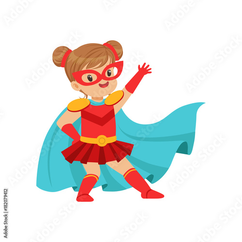 Comic brave kid in superhero red costume with mask on face and developing in the wind blue cloak, posing and waving her hand.