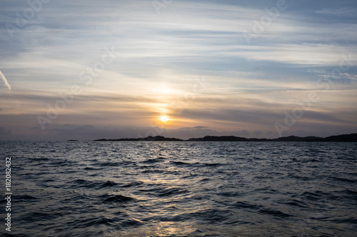 Sun is setting over the archipelago  Kristiansand Norway