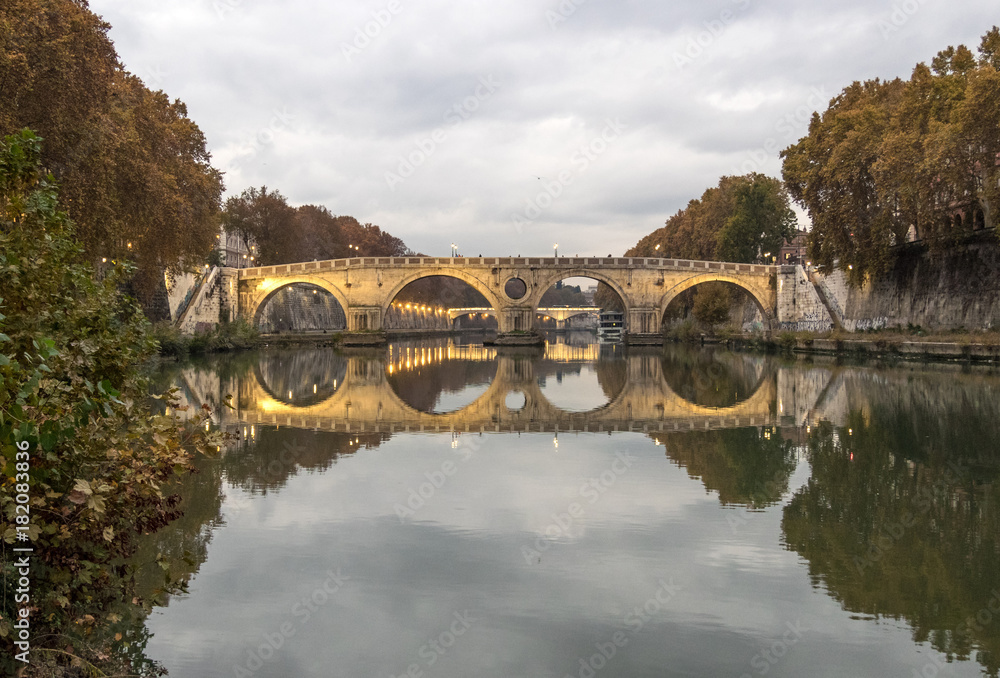Rome (Italy) - The Tiber river and the monumental Lungotevere. Here in particular the Ponte Sisto bridge