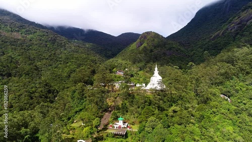 Aerial view of the monastery with ancient temple in the valley on Adam Peak in Sri Lanka