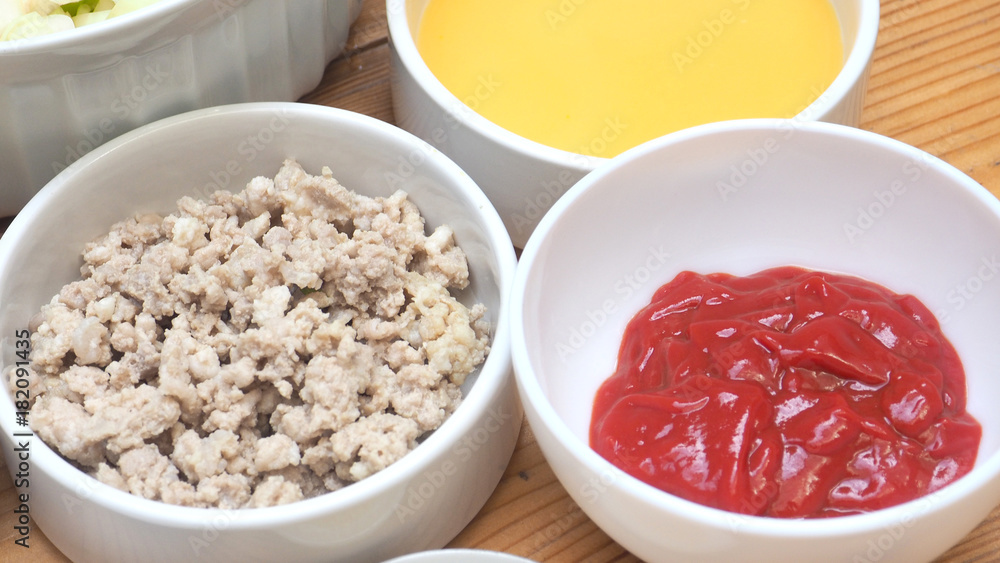 Ingredients of food menu are pork chops boiled with tomato sauce and eggs Ingredients of food menu are pork chops boiled with tomato sauce and eggs