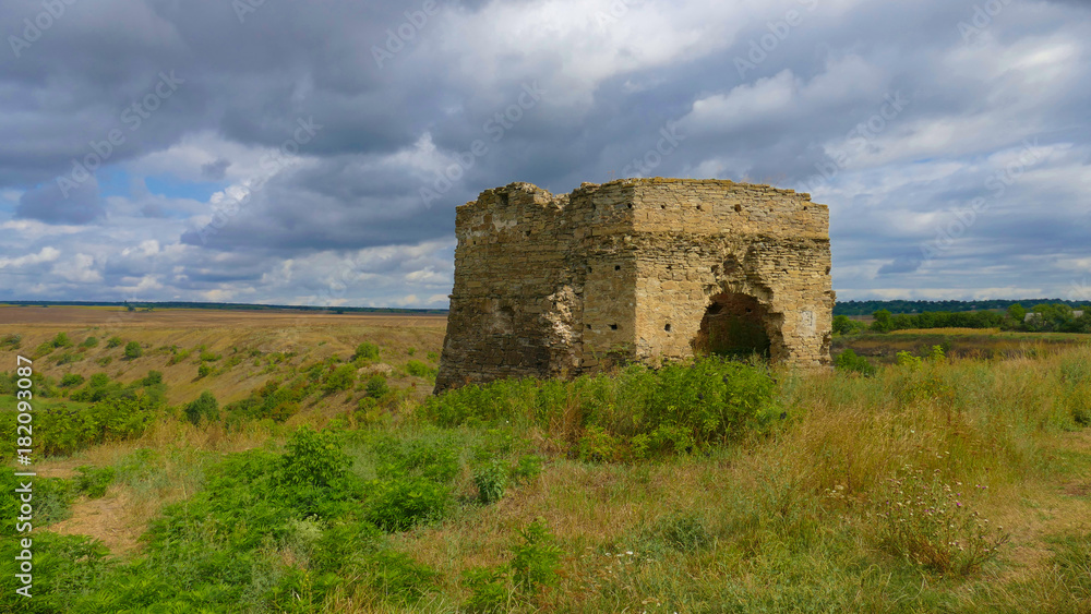 Tower of the former castle in Zhvanets on the river Zhvanets and Dniester. Single tower - the ruins of the former border fortress of Poland currently Ukraine Tower of the former castle in Zhvanets on the river Zhvanets and Dniester. Single tower - the ruins of the former border fortress of Poland currently Ukraine