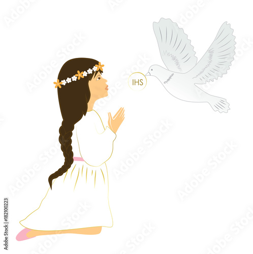 My first communion. Cute girl with brown hair praying on knees.