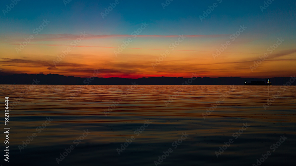 Tranquil Seascape Scene, with beautiful after sunset  orange color tones