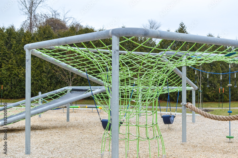 Modern children playground in park in Canada