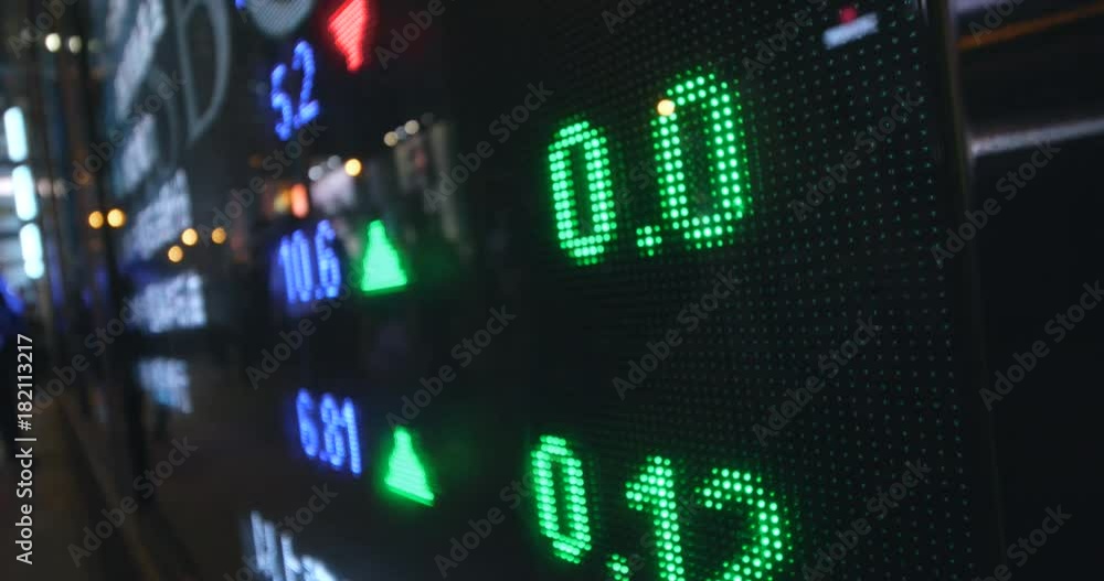 Display screen showing stock market prices Display screen showing stock market prices