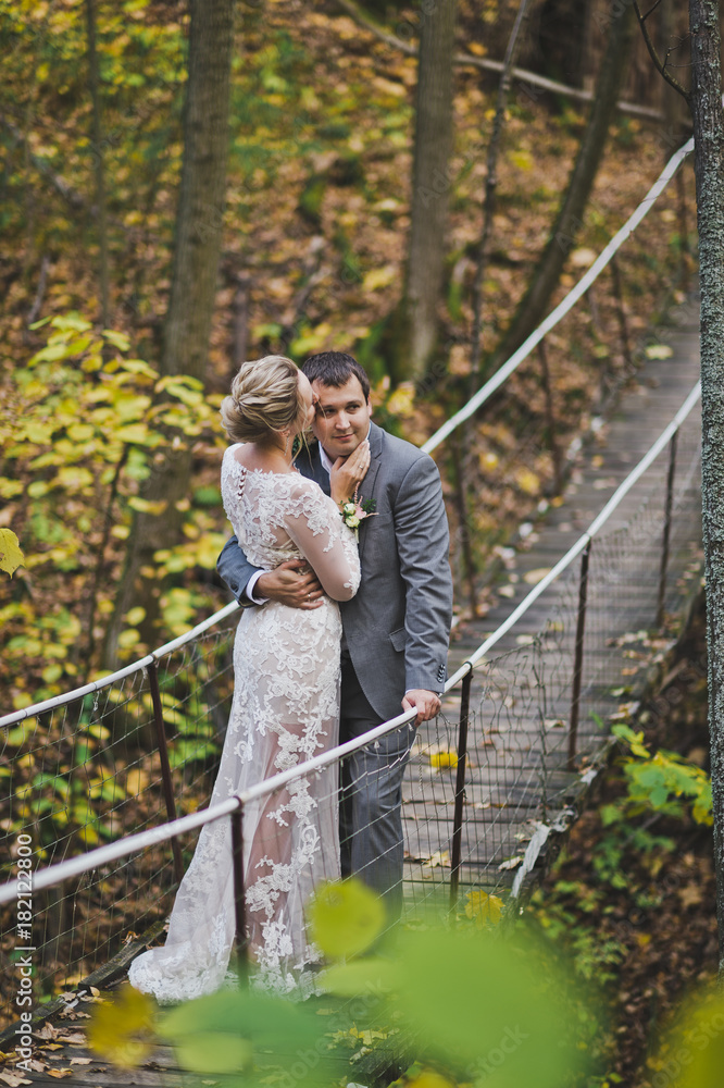 Fototapeta premium The first way of life together on a shaky hanging bridges 192.