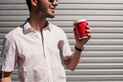 business man has a coffee break. energy drink to keep up effective work during the day concept