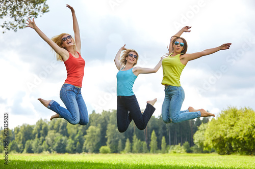 three girls having fun outdoors