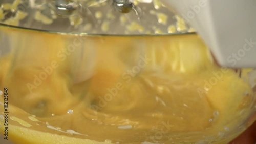 Process of manual stirring dough for dessert photo