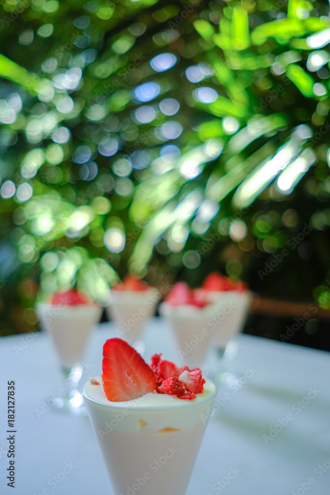 Dessert strawberries and cream. (selective focus) Dessert strawberries and cream. (selective focus)