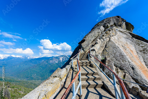 Hike on Moro Rock Staircase toward mountain top, granite dome rock formation in Sequoia National Park, Sierra Nevada mountains, California, USA
