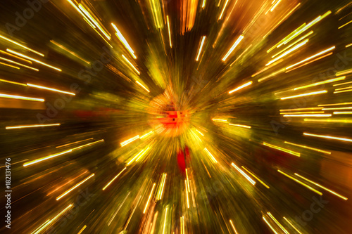 light lines with long exposure,  speed motion abstract background in the dark night ,  blast zoom effect , zoom burst light of christmas tree