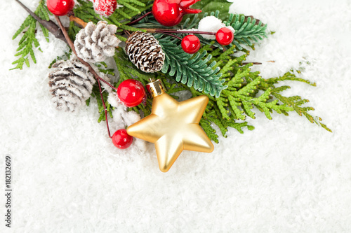 Christmas Border with Xmas Decor, Green Fir Twig and Glass Balls on White Snow Background