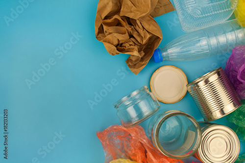 Fotografía Closeup of waste on blue background. Top view.