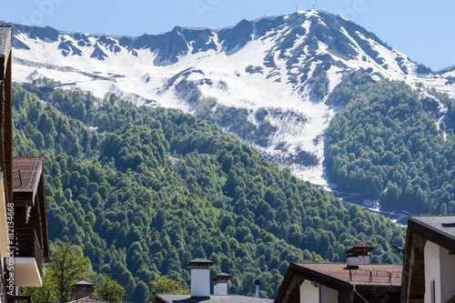 snow-capped mountain peaks against the blue sky