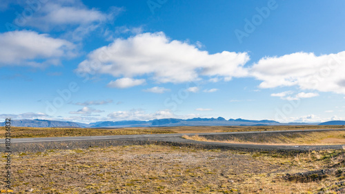 country road in landscape in Iceland in sunny day