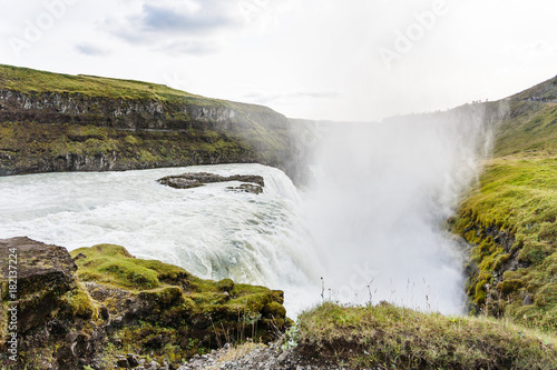 flow of Gullfoss waterfall in canyon of Olfusa