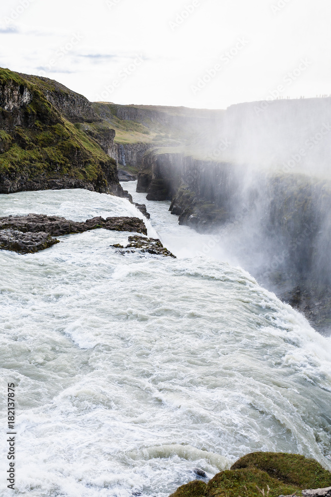 Gullfoss waterfall falls at the bottom of canyon Gullfoss waterfall falls at the bottom of canyon