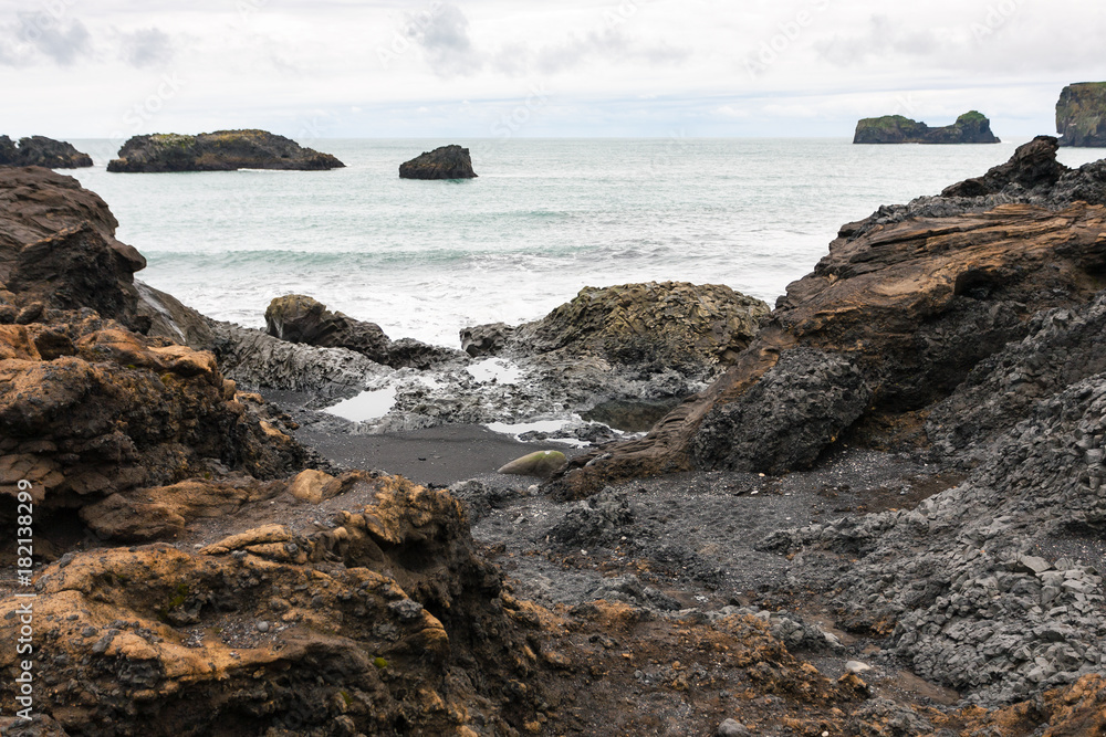 Atlantic ocean volcanic coastline in Iceland Atlantic ocean volcanic coastline in Iceland