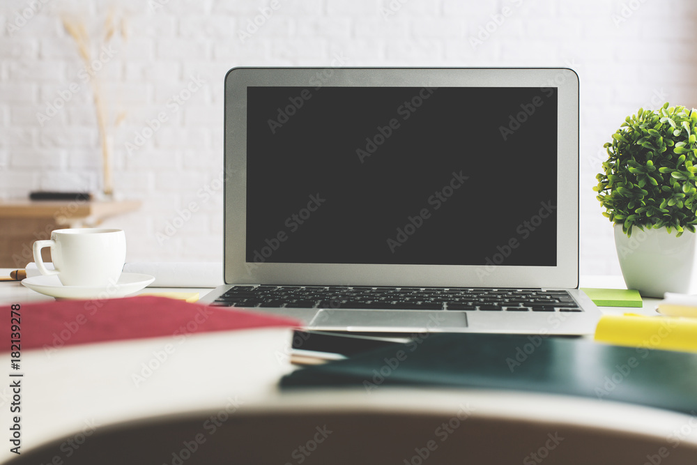 Fototapeta premium Stylish workplace with empty laptop screen